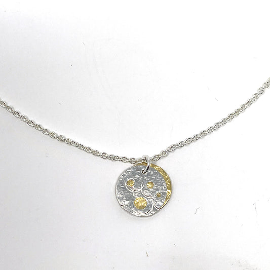 Silver and Brass Pierced Disc Necklace