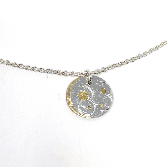 Silver and Brass Pierced Disc Necklace