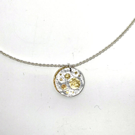 Silver and Brass Pierced Disc Necklace